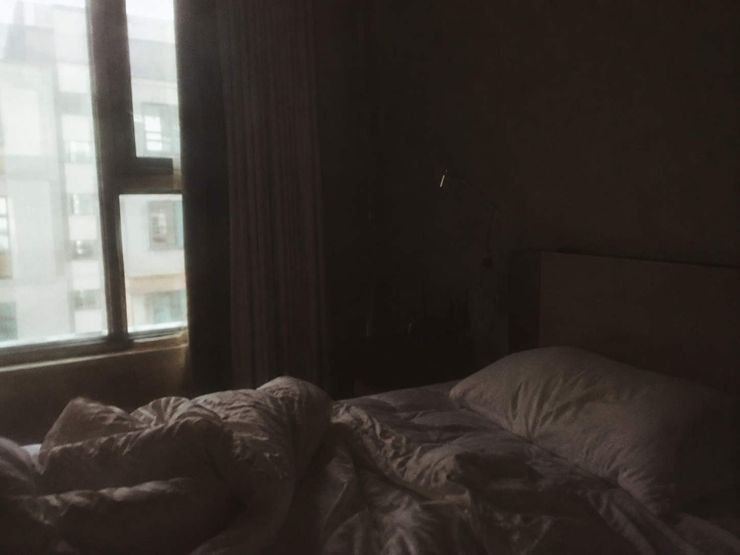 A lonely unmade bed representing how my husband keeps finances separate and distant