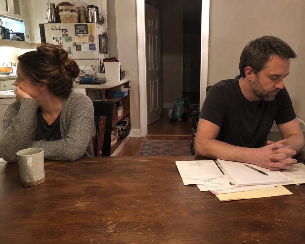 career vs family conversation between husband and wife at home