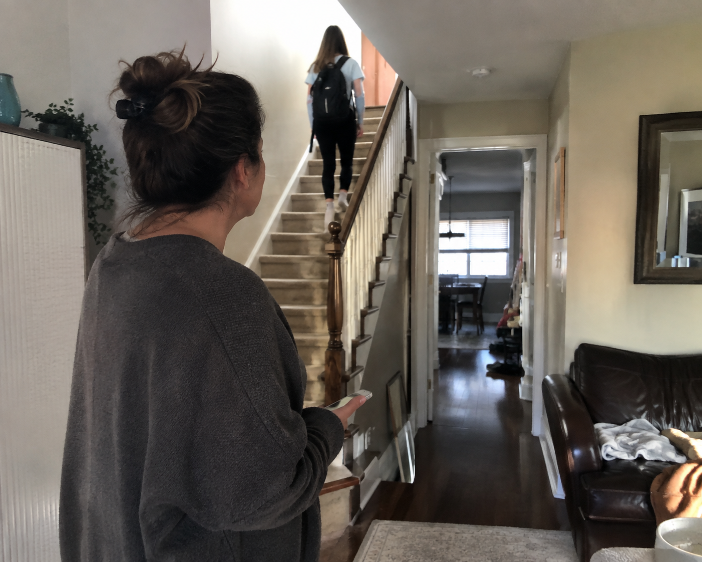 Mother learning about respecting teen privacy after finding her daughter's phone
